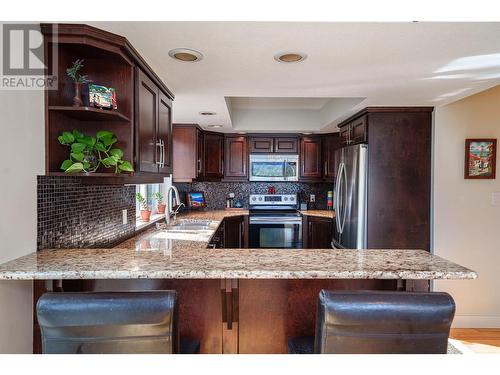 8617 Fitzmaurice Drive, Coldstream, BC - Indoor Photo Showing Kitchen With Stainless Steel Kitchen With Upgraded Kitchen