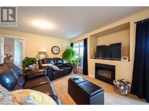 8617 Fitzmaurice Drive, Coldstream, BC - Indoor Photo Showing Living Room With Fireplace