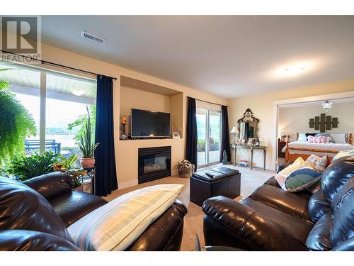 8617 Fitzmaurice Drive, Coldstream, BC - Indoor Photo Showing Living Room With Fireplace