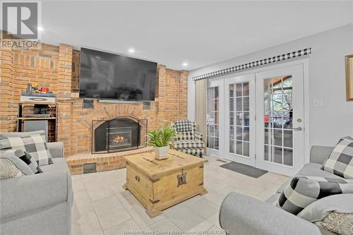 21166 Erie Street South, Wheatley, ON - Indoor Photo Showing Living Room With Fireplace