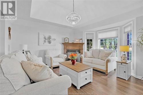 21166 Erie Street South, Wheatley, ON - Indoor Photo Showing Living Room With Fireplace