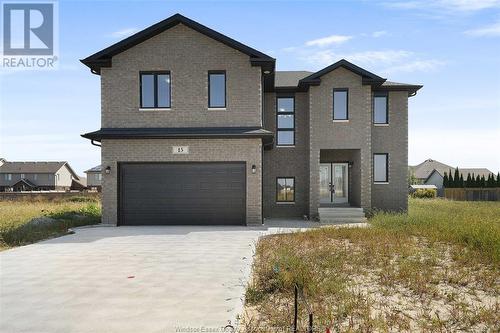 15 Cherry Blossom Trail, Chatham, ON - Outdoor With Facade