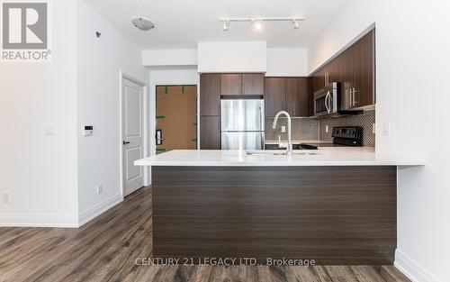 1606 - 65 Speers Road, Oakville, ON - Indoor Photo Showing Kitchen With Stainless Steel Kitchen