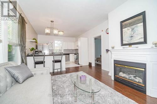 19 Ritson Road S, Oshawa (Central), ON - Indoor Photo Showing Living Room With Fireplace