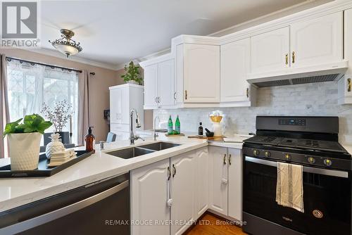 69 Jays Drive, Whitby (Williamsburg), ON - Indoor Photo Showing Kitchen With Double Sink