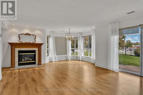 PETERBOROUGH, ON - Indoor Photo Showing Living Room With Fireplace