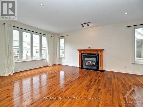 454 Brunskill Way, Ottawa, ON - Indoor Photo Showing Living Room With Fireplace