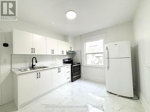 176 Church Street, St. Catharines, ON - Indoor Photo Showing Kitchen With Double Sink