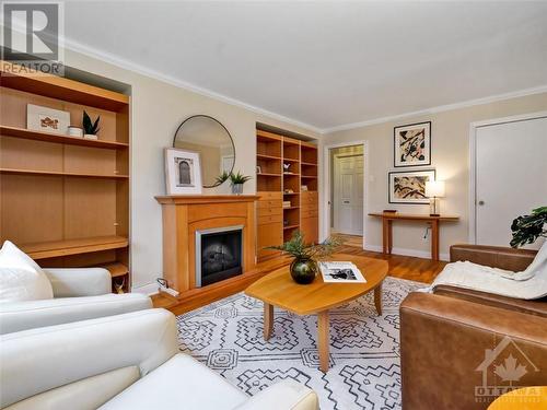 33 Farnham Crescent, Ottawa, ON - Indoor Photo Showing Living Room With Fireplace