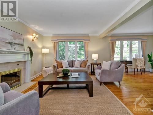 33 Farnham Crescent, Ottawa, ON - Indoor Photo Showing Living Room With Fireplace