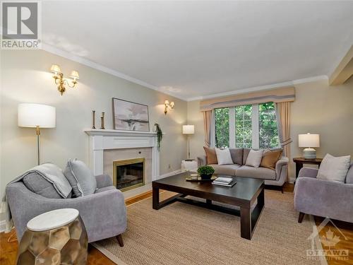 33 Farnham Crescent, Ottawa, ON - Indoor Photo Showing Living Room With Fireplace