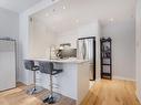 Kitchen - 411-131 Ch. Bates, Mont-Royal, QC  - Indoor Photo Showing Kitchen With Upgraded Kitchen 