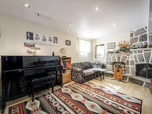 Family room - 13184 Rue Shelborne, Montréal (Pierrefonds-Roxboro), QC - Indoor Photo Showing Other Room With Fireplace