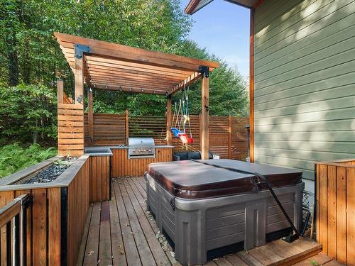 Backyard - 40 Ch. Des Magnolias, Mont-Tremblant, QC - Outdoor With Deck Patio Veranda With Exterior