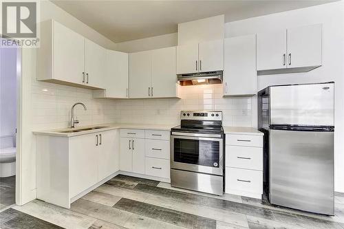 1016 Clarance Avenue, Kelowna, BC - Indoor Photo Showing Kitchen With Double Sink With Upgraded Kitchen