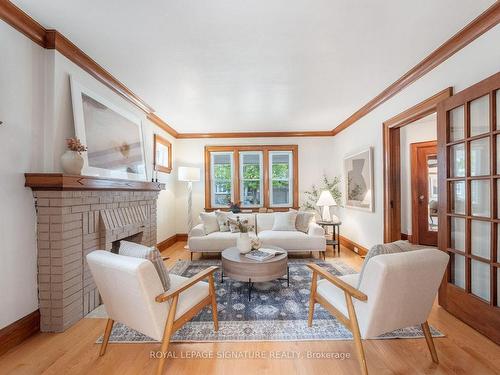 24 Chilton Rd, Toronto, ON - Indoor Photo Showing Living Room With Fireplace