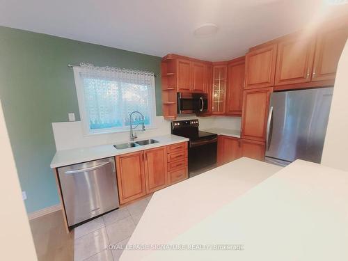 55 Bow Valley Dr, Toronto, ON - Indoor Photo Showing Kitchen With Double Sink