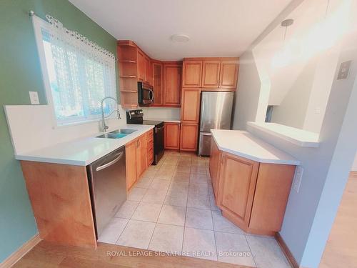 55 Bow Valley Dr, Toronto, ON - Indoor Photo Showing Kitchen With Double Sink