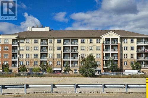 423 - 10 Mendelssohn Street, Toronto (Clairlea-Birchmount), ON - Outdoor With Balcony With Facade