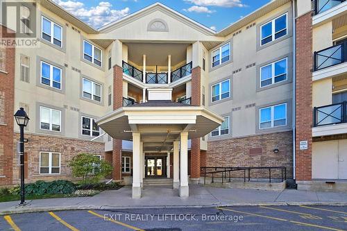 423 - 10 Mendelssohn Street, Toronto (Clairlea-Birchmount), ON - Outdoor With Balcony With Facade