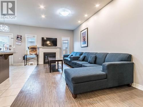 61 Sonoma Valley Crescent, Hamilton, ON - Indoor Photo Showing Living Room With Fireplace