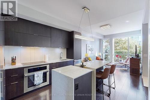 112 - 55 Regent Park Boulevard, Toronto, ON - Indoor Photo Showing Kitchen With Upgraded Kitchen