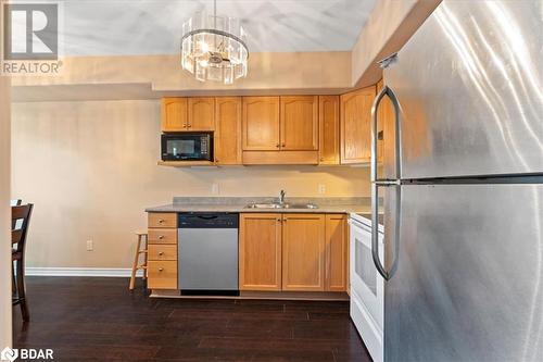 15 Heartwood Drive Unit# 107, Belleville, ON - Indoor Photo Showing Kitchen With Double Sink