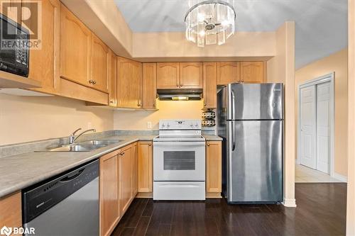 15 Heartwood Drive Unit# 107, Belleville, ON - Indoor Photo Showing Kitchen With Double Sink