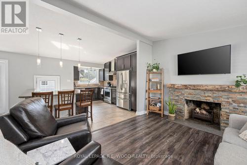 67 Dennis Avenue, London, ON - Indoor Photo Showing Living Room With Fireplace