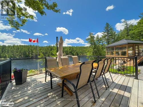 254G X-Bay Road, Killarney, ON - Outdoor With Body Of Water With Deck Patio Veranda