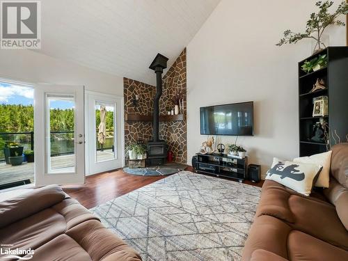 Living room - 254G X-Bay Road, Alban, ON - Indoor Photo Showing Living Room With Fireplace