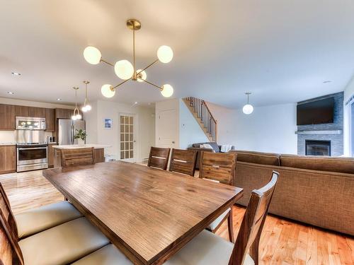 Kitchen - 600 Ch. Olivier, Saint-Côme, QC - Indoor Photo Showing Dining Room With Fireplace