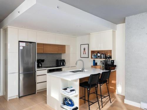 809-989 Johnson St, Victoria, BC - Indoor Photo Showing Kitchen With Stainless Steel Kitchen With Double Sink