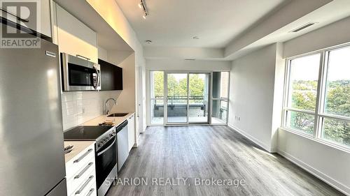 513 - 25 Neighbourhood Lane, Toronto, ON - Indoor Photo Showing Kitchen With Upgraded Kitchen