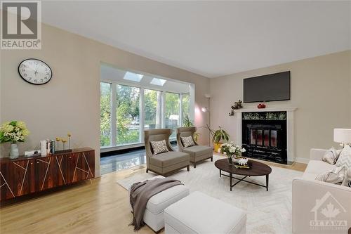 1598 Abbey Road, Ottawa, ON - Indoor Photo Showing Living Room With Fireplace