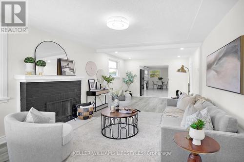 100 Lincoln Place, London, ON - Indoor Photo Showing Living Room With Fireplace