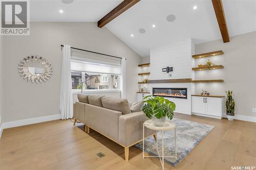 238 Kenaschuk Union, Saskatoon, SK - Indoor Photo Showing Living Room With Fireplace