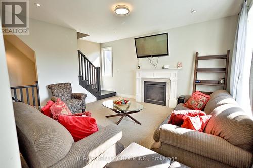 72 Carolina Crescent, St. Thomas, ON - Indoor Photo Showing Living Room With Fireplace