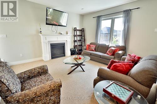 72 Carolina Crescent, St. Thomas, ON - Indoor Photo Showing Living Room With Fireplace