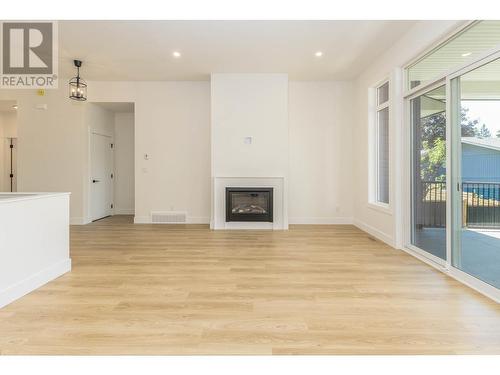 111 20 Street Se, Salmon Arm, BC - Indoor Photo Showing Other Room With Fireplace