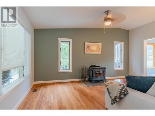 350 Johnstone  Road, Nelson, BC - Indoor Photo Showing Living Room With Fireplace