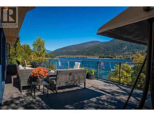 350 Johnstone  Road, Nelson, BC - Outdoor With Body Of Water With Deck Patio Veranda