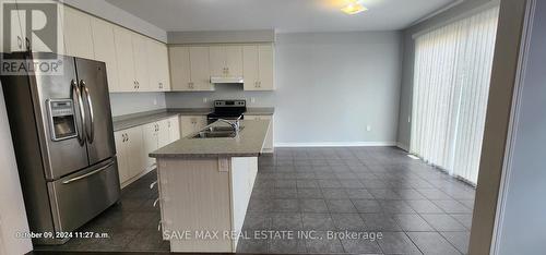 64 Enford Crescent, Brampton, ON - Indoor Photo Showing Kitchen With Double Sink