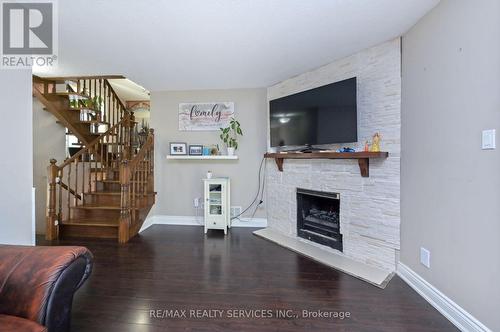 8 Mount Pleasant Drive, Brampton, ON - Indoor Photo Showing Living Room With Fireplace