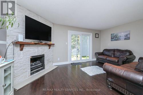 8 Mount Pleasant Drive, Brampton, ON - Indoor Photo Showing Living Room With Fireplace