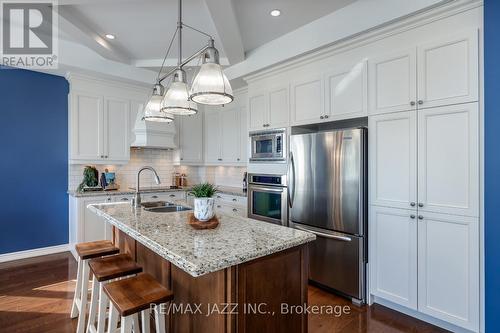 1 - 345 Lakebreeze Drive, Clarington (Newcastle), ON - Indoor Photo Showing Kitchen With Stainless Steel Kitchen With Double Sink With Upgraded Kitchen