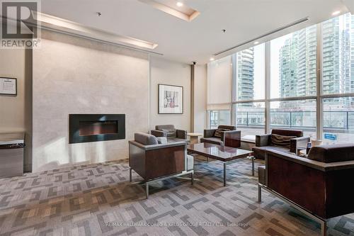 1209 - 18 Harbour Street, Toronto, ON - Indoor Photo Showing Living Room With Fireplace