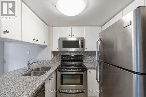 1019 - 18 Laidlaw Street, Toronto, ON - Indoor Photo Showing Kitchen With Double Sink