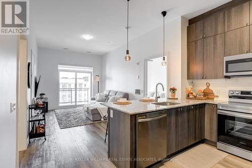 609 - 460 Gordon Krantz Avenue, Milton, ON - Indoor Photo Showing Kitchen With Upgraded Kitchen