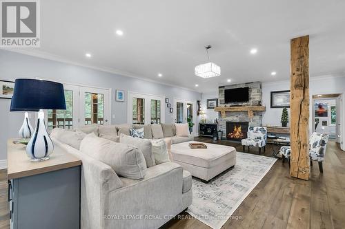 7 Fox Run Drive, Puslinch, ON - Indoor Photo Showing Living Room With Fireplace